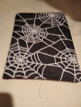 Buchumschlag Spinnennetz schwarz