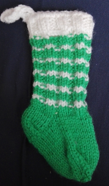 Sparstrumpf grün-weiß